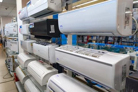 Display of air conditioning units in an electronics store showcasing various Stock Photos