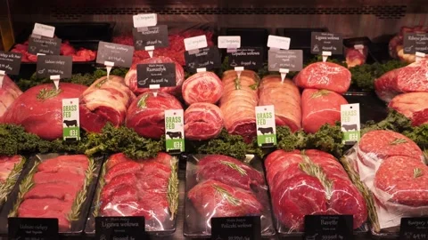Display of assorted chopped raw red meat. Fresh organic meat department in Stock Footage 144875315
