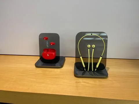 A display of Beats Studio Buds and Beats Flex Headphone at an Apple Store in  写真素材