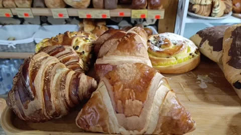 A display case filled with lots of different types of bread Stock Footage 293510224