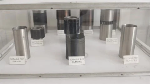 Display Case of Heavy Duty Engine Cylinder Liners Compatible Stock Footage 332143774