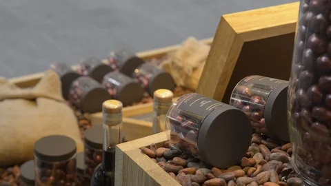 Display of cocoa beans and luxury chocolate Stock Footage 92936699