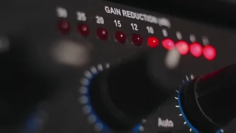 Display compressor settings at the deck during sound recording in studio Stock Footage 69126205