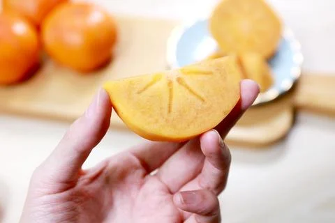 Display of crispy persimmon Stock Photos