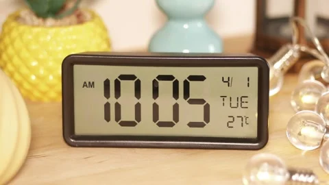 Display of digital clock showing time and date details Video stock 316517374