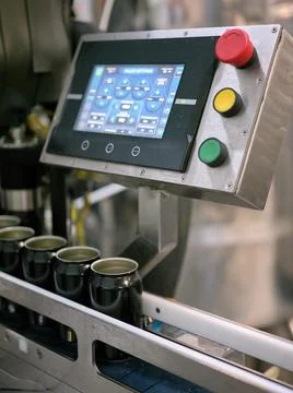Display of an electronic machine in a craft beer canning plant Stock Photos