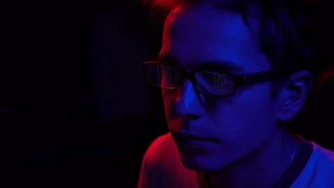 Display in the eye. programmer at the computer. display in glasses Stock Footage 124360803