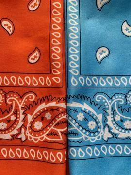 This display features two bandanas, one in vivid red and the other in bright Stock Photos