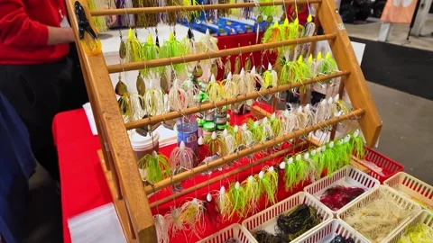 Display of hooks and plastic lures for fishing inside Canadian sport store... Stock Footage 311270967