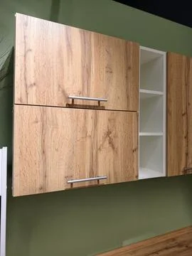 Display kitchens featuring smart storage solutions arranged in a showroom f.. Фото