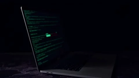 Display Of Laptop Computer Hacking And Downloading Data In The Dark Room Stock Footage 157193419