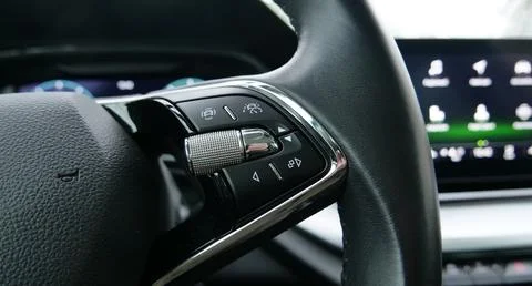 Display with Menu Icons Behind Steering Wheel Stock Photos