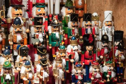 Display of nutcracker soldiers and decorations on sale at Christmas market st Stock Photos