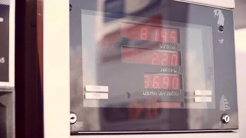 Display for petrol. The driver pumping gasoline at the gas station. 動画素材 83294401
