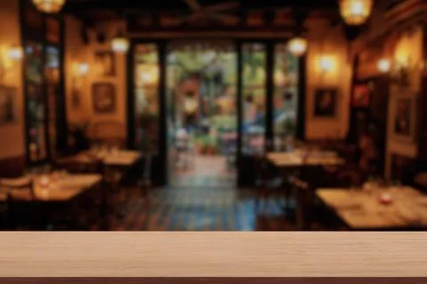 Display Products Empty Wood Table on a Blur of Small Restaurant Interior Ba.. Stock Illustration