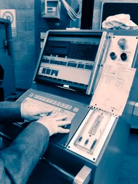 Display of programmable machine with big red button. Stock Photos
