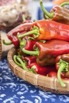 Display of red bell peppers. Stock Photos