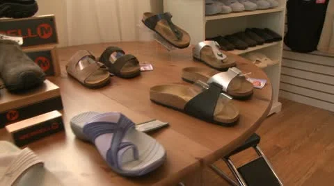 Display of shoes in a small boutique (3 or 6) Stock Footage 10774351
