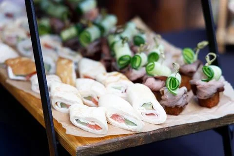 A display stand set up with appetizers and canapes for a banquet table Stock-Fotos