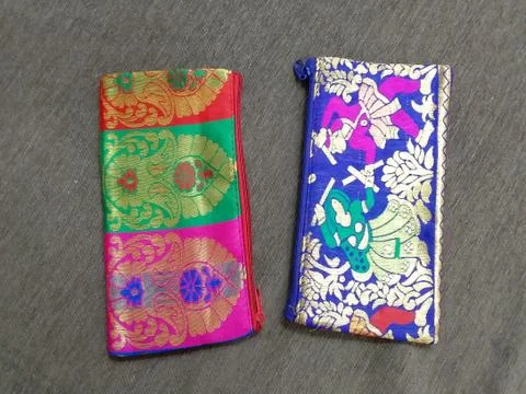 Display of two traditional purses Stock Photos