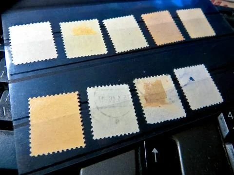Displayed Are Various Postage Stamps Revealing Unique Designs and Historica.. Stock Photos