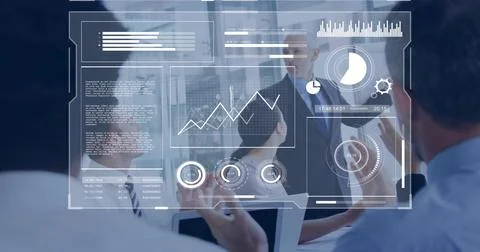 Displaying AR data dashboard overlaying conference table in corporate meeting, Stock Photos