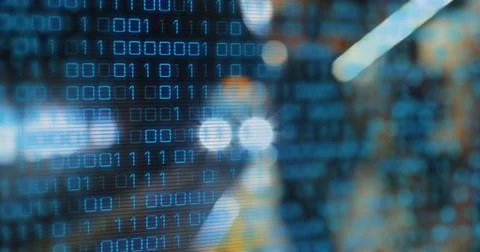 Displaying binary code overlay flickering on abstract interface, featuring rows Stock Photos