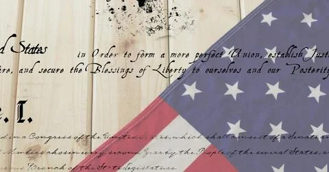 Displaying centered panel showing Preamble script and partial US flag on light Stock Photos