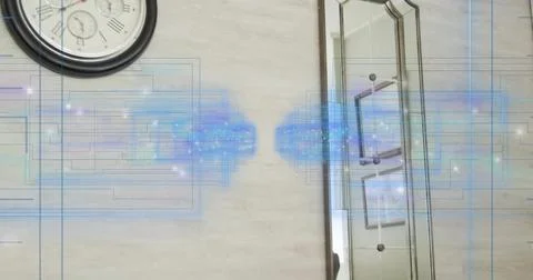 Displaying central blue digital overlay glowing on beige wall, showing clock and Stock Photos