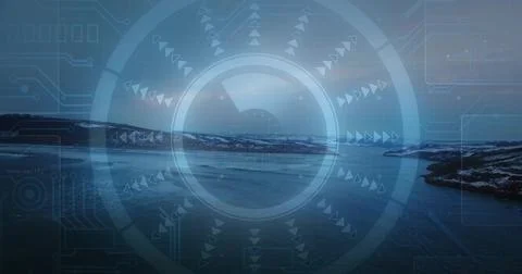 Displaying central translucent HUD reticle over cold coastal bay, showing Stock Photos
