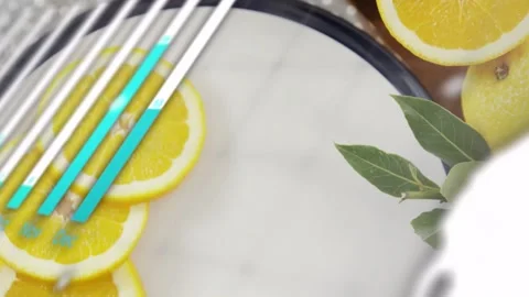 Displaying central white bowl rotating on wooden board, showing lemons and code Stock Footage 332523734