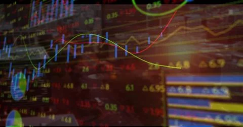 Displaying charts showing candlesticks, moving averages at desk with coffee mug, Stock Photos