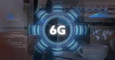 Displaying circular 6G holographic interface rotating over office desk, with Stock Photos