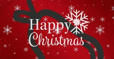 Displaying cursive Happy Christmas text on red background, with snowflake icon Stock Photos