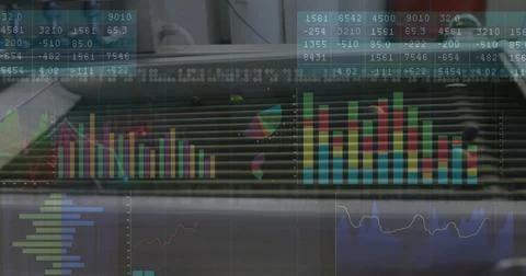 Displaying data visualization overlay on office glass panel with colorful cha Stock Photos