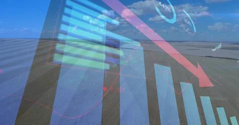 Displaying declining financial graphics over open flat landscape, with blue Stock Photos