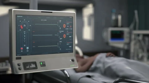 Displaying decreasing rate of patients breathing activity on hospital monitor 库存影片 248268129