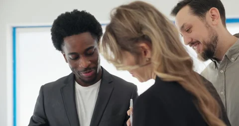 Displaying a deep understanding of local market, African real estate agent Stock Footage 277685446