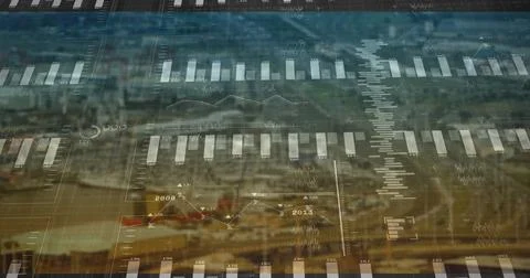 Displaying digital data overlay on city harbor skyline, with bar and line charts 스톡 사진