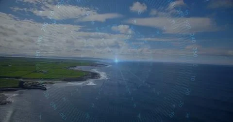 Displaying digital HUD compass gauge hovering above coastal cliffs meeting Stock Photos