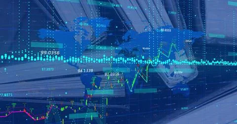 Displaying digital interface with world map, charts and labels over office desk Stock Photos