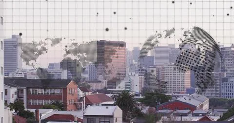 Displaying dotted map and globe graphic floating on grid panel at city skyline Foto stock