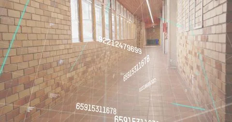 Displaying empty brick corridor showing floating numerical data grid inside 写真素材