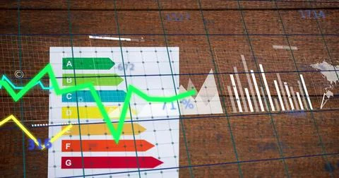 Displaying energy chart sitting left on wood table, with neon yellow lines, Stock Photos