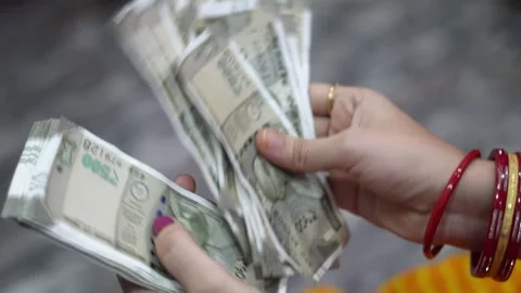 Displaying Fresh Stack of Indian 500 Rupee Banknotes Held by Woman Hands. Stock Footage 340108366
