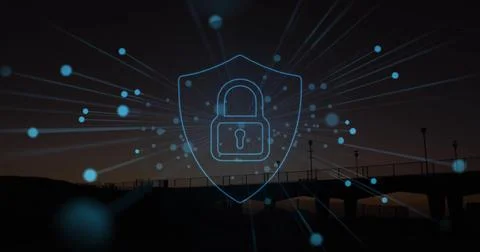 Displaying glowing blue padlock in shield on silhouetted pier at dusk, featuring Stock Photos