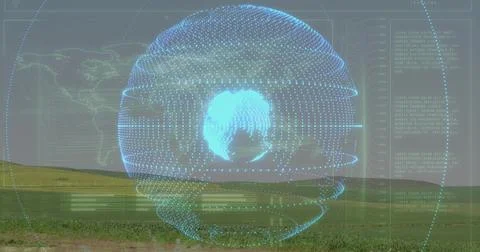 Displaying holographic data sphere dominating open rural field, with HUD maps Stock Photos