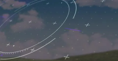 Displaying HUD overlay hovering over grassy hill at dusk, with concentric arcs Stock Photos