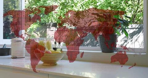 Displaying kitchen sill scene catching sunlight, red map projecting, with fruit Stock Photos