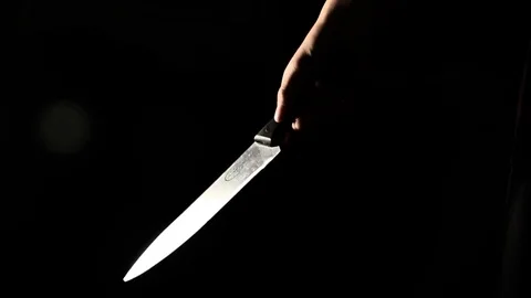 Displaying a knife/murder weapon Stock Footage 79707864